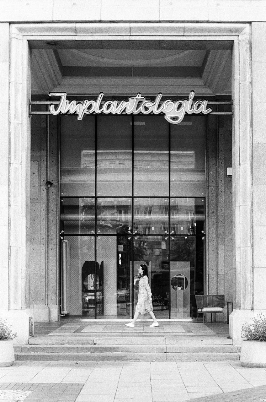 Black-and-white photograph of a storefront entrance